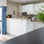 Olympics 1br With Pool & Balcony, By Hopstays